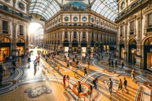 Crowd-of-people-in-Galleria-Vittorio-Emanuele-II-at-sunset-Milan-Italy-cm.jpg