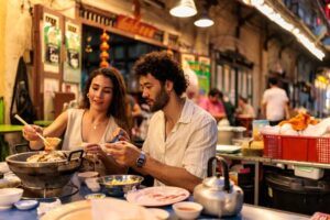 Couple-enjoying-a-cozy-hot-pot-dinner-side-by-side-cm.jpg